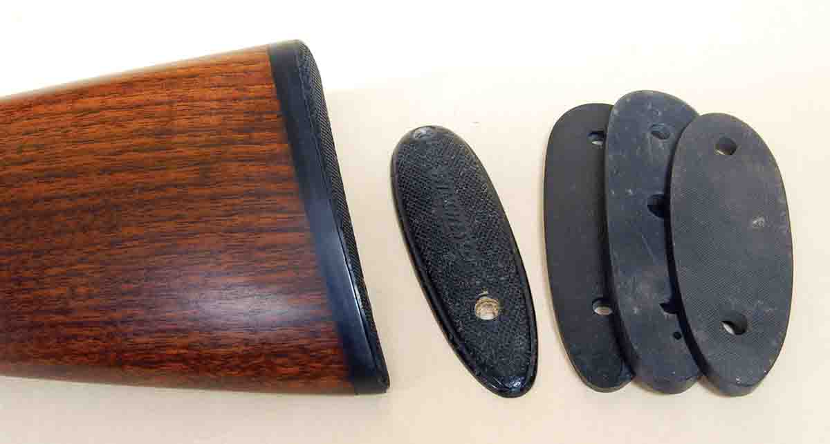 The buttplate attached to this stock is the same plate shown just to the right, but glued to a black spacer (three are shown) to add .25 inch to length of pull.